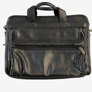TUMI Black Leather Laptop Briefcase with Multiple Compartments